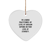 Funny Heart Ornament for Nurse Practitioner Gifts from Friends, Coworkers, or Family - 'I'm A Nurse Practitioner. My Level Of Sarcasm Depends On Your Level Of Stupidity.' - Image 1
